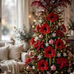 A tall Christmas tree crowned with a fanned spray of burgundy feathers, silver sequin sprigs and red berry picks, huge red amaryllis and poinsettia blooms, candy-striped balls, white snowflakes, warm white lights, cozy living room with soft window light